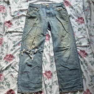 Vintage Levi’s Worn In Distressed Pale Blue Jeans, 32x34